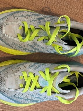 Hoka Women’s 7 Speedgoat Lightweight Running Shoes in Pale Blue and Neon Yellow